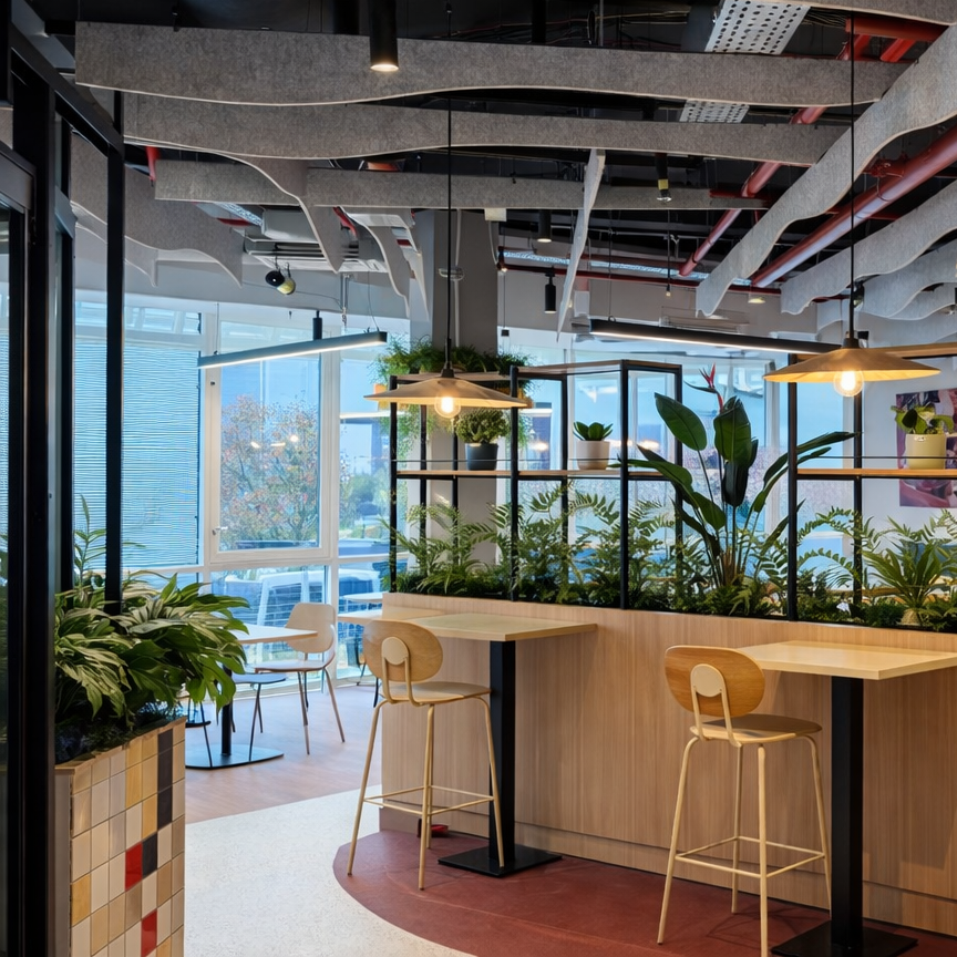Amenagement cafeteria Coca Cola Grigny Design biophylique edited e1780924836382