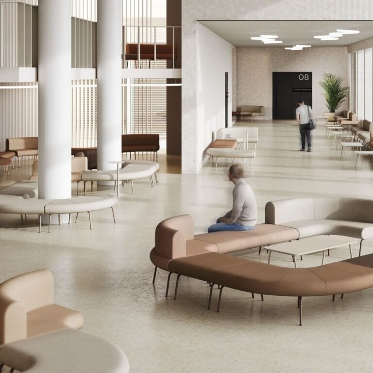 Hall d accueil entreprise concu par IDEAKO — mobilier sur mesure et matieres selectionnees - IDEA&KO