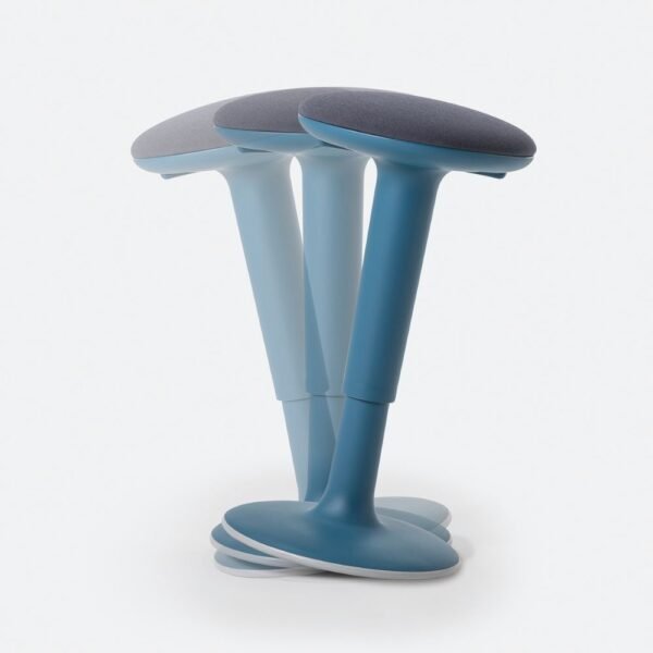 Tabouret Tuc Tuc de profil — embase oscillante et assise capitonnee Tabouret Tuc Tuc de profil — embase oscillante et assise capitonnee