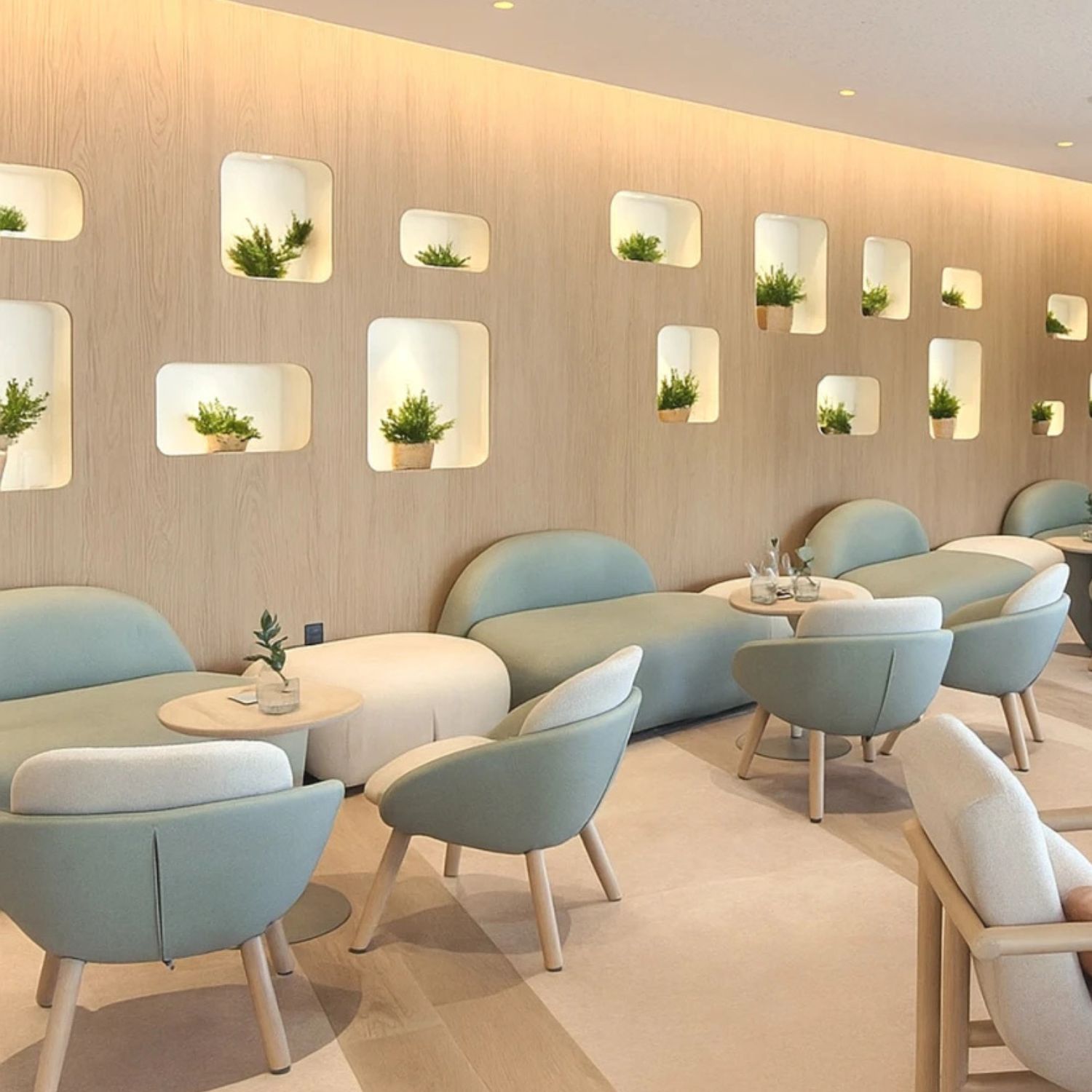 Fauteuil restaurant design Cross pietement 4 pieds bois espace lounge