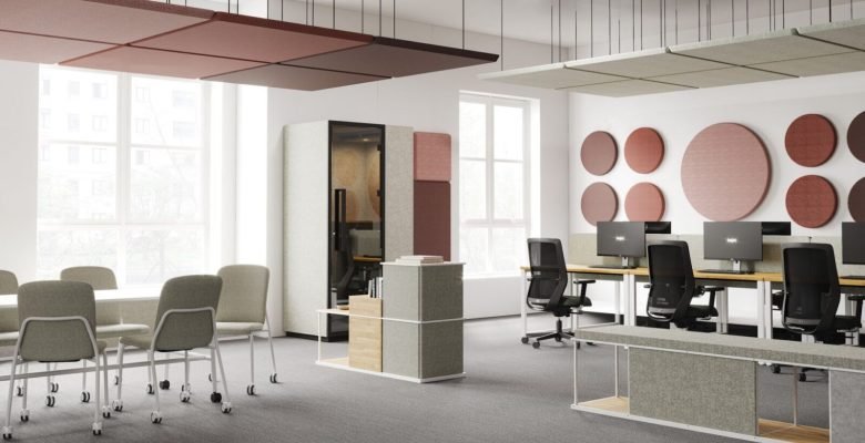 Open space aménagé avec traitement acoustique panneaux suspendus et cabines